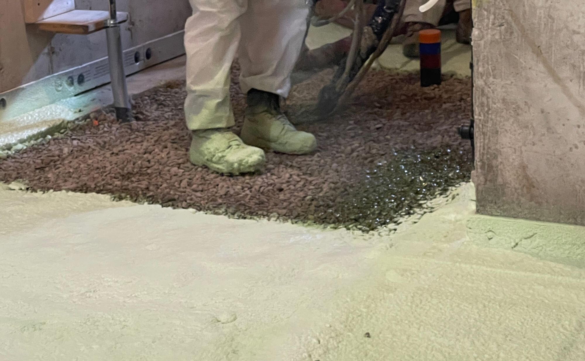 spray foaming gravel floor